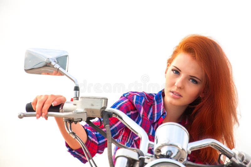 Beautiful, sexy, young woman on a motorcycle stock images Beautiful, sexy, young woman on a motorcycle stock images