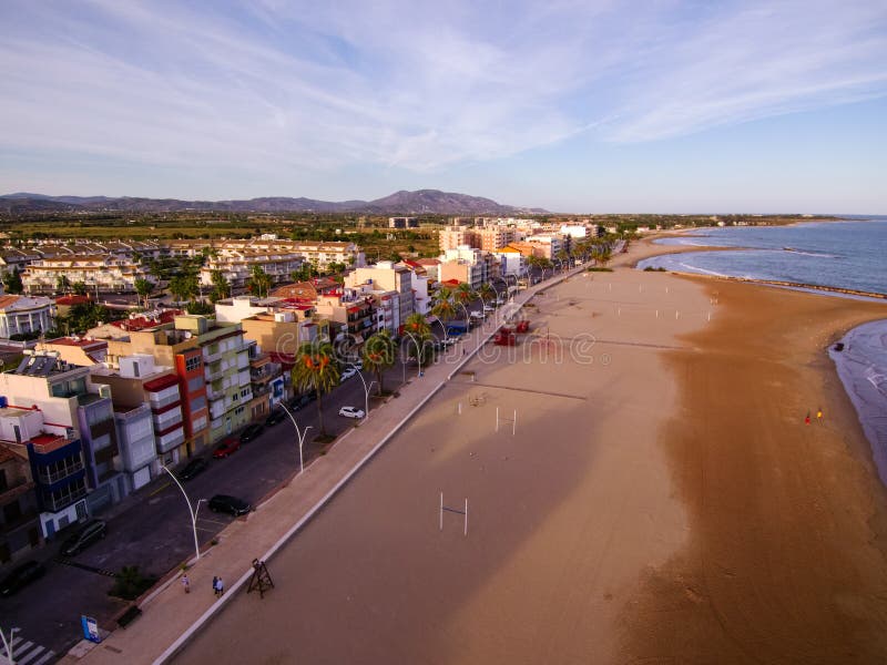 Beautiful shot of the long shoreline of Torrenostra in the Valencian Community in Spain