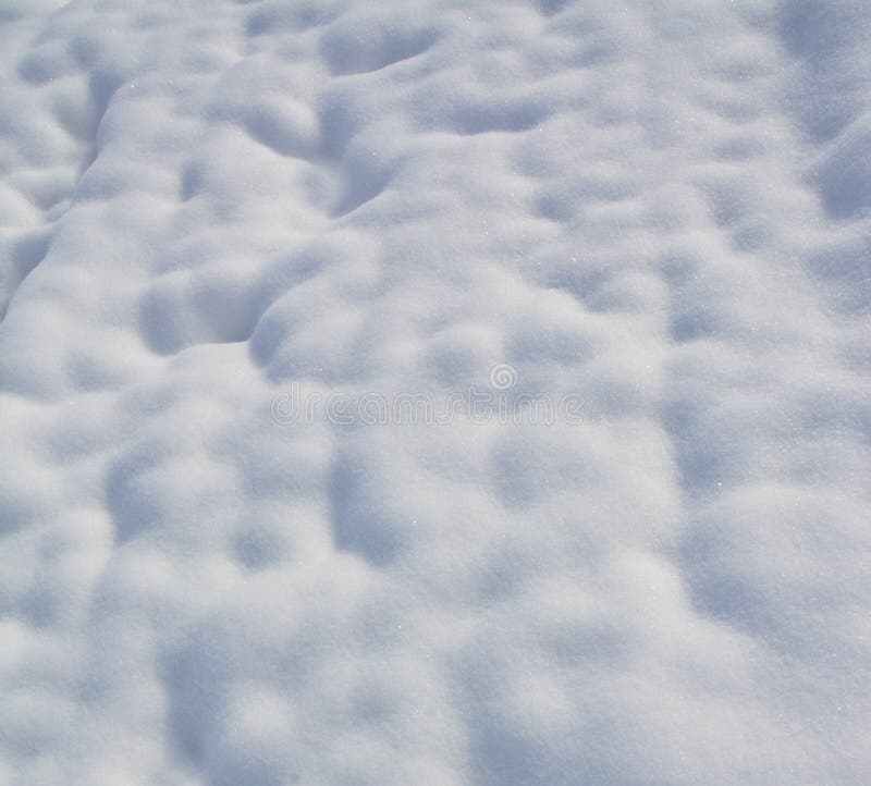 Beautiful shot of snow dune with a winter background stock photo