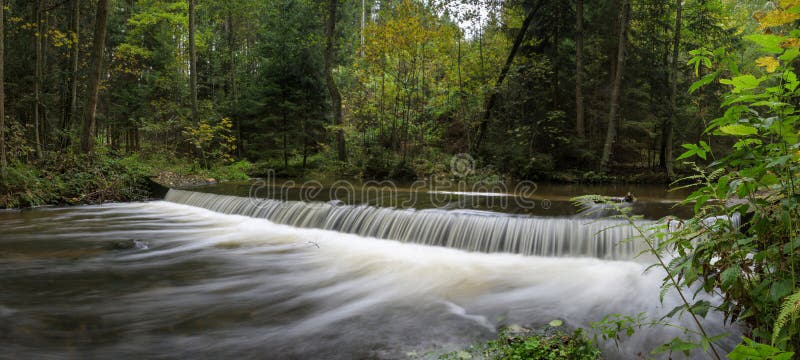 A beautiful shot of a swiftly flowing waterfall royalty free stock images A beautiful shot of a swiftly flowing waterfall royalty free stock images