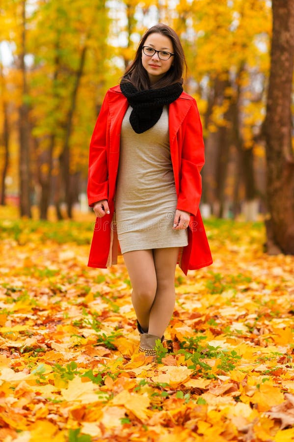 Beautiful slender Korean girl in autumn forest stock photography Beautiful slender Korean girl in autumn forest stock photography