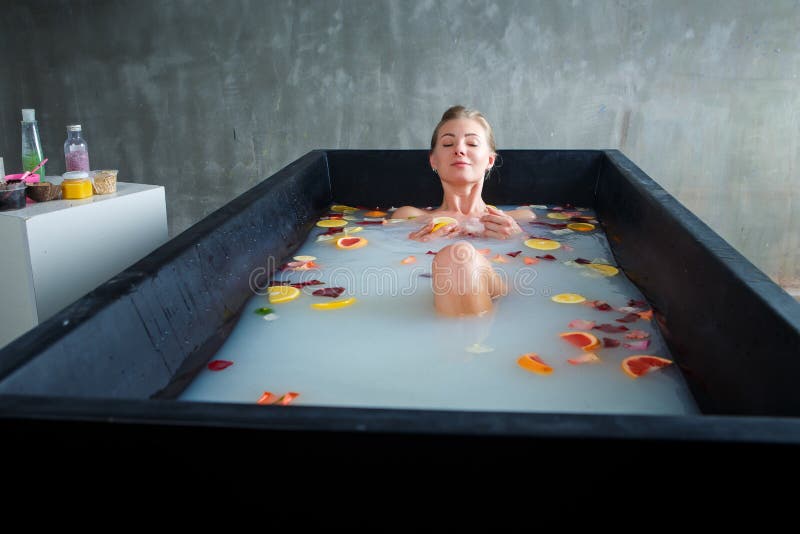 Blonde Girl Taking A Hot Bath