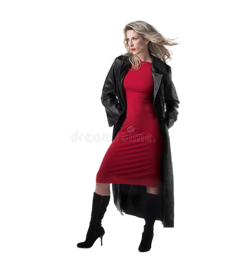 Beautiful,slim blonde woman, red dress, black coat royalty free stock images Beautiful,slim blonde woman, red dress, black coat royalty free stock images