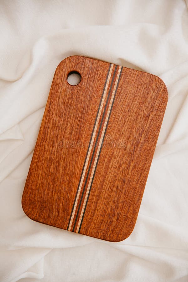 Beautiful Small Dark Hardwood Cutting Board on White Background Stock