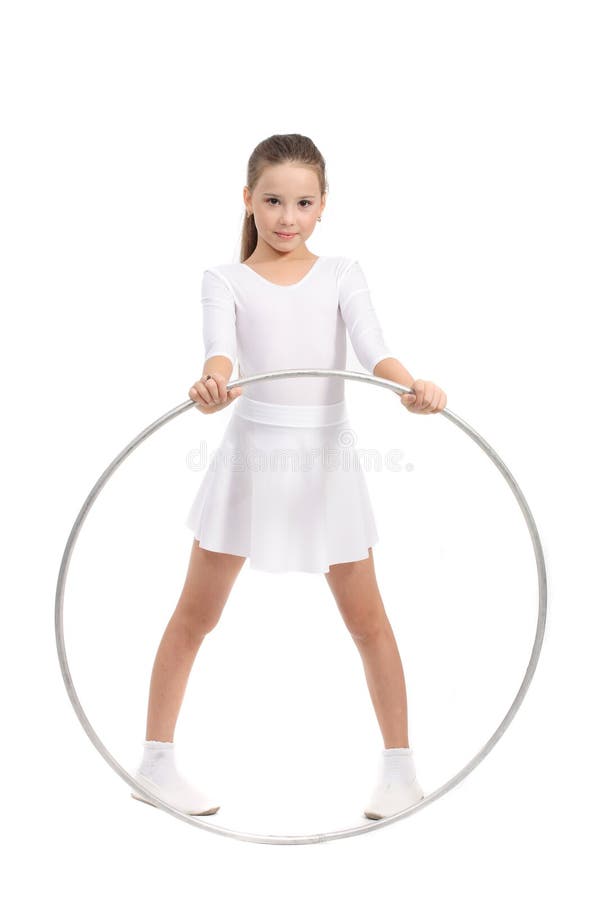 Beautiful small gymnastic girl, in white clothes, with hoop in hand, on white background