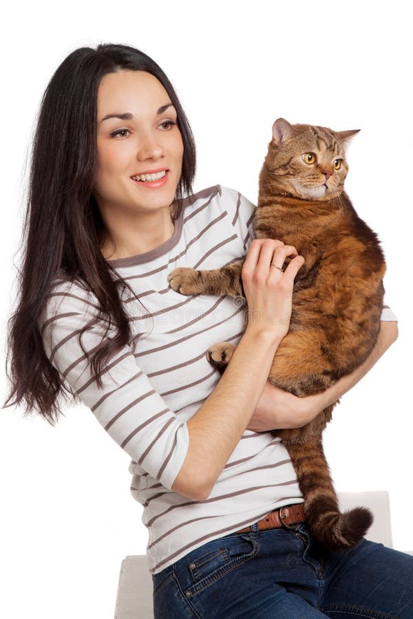 Beautiful Smiling Brunette Girl And Her Ginger Cat Over White Ba Stock