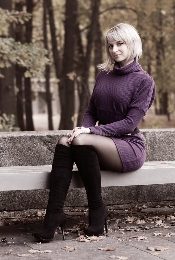 Beautiful smiling girl and autumn scenery