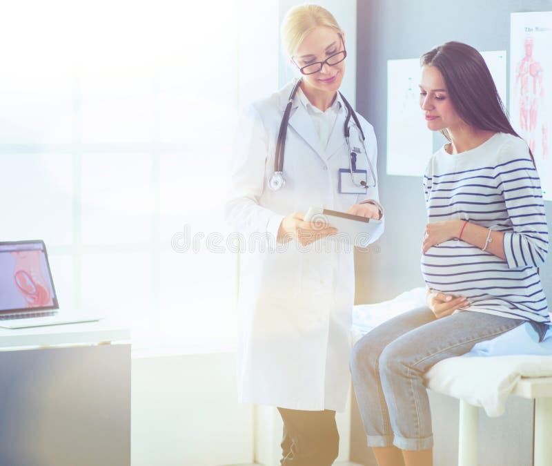 Beautiful Smiling Pregnant Woman With The Doctor At Hospital Stock Image Image Of Fetus 