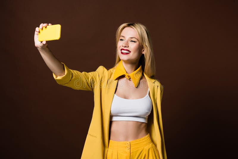 Blonde girl taking a selfie with her hair down - wide 5