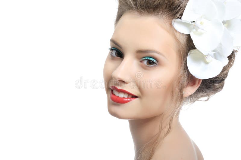 Beautiful smiling woman with flowers isolated on white