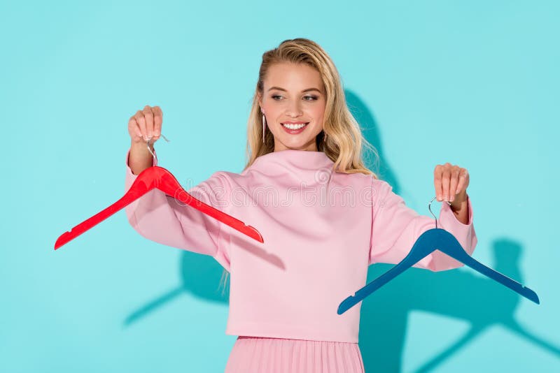 Beautiful Smiling Woman Holding Empty Clothes Hangers Stock Image ...