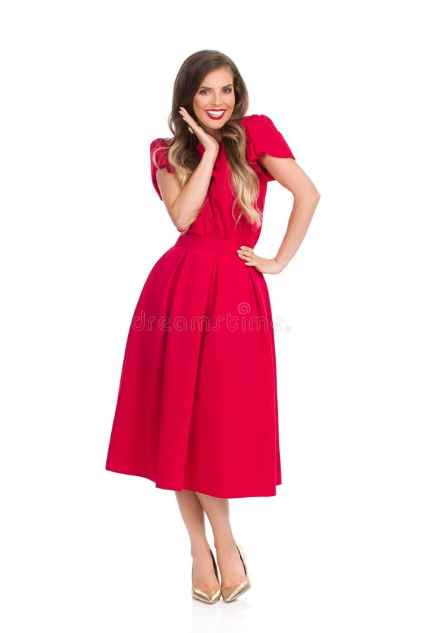 Beautiful Smiling Young Woman in Red Dress and High Heels Stock Image