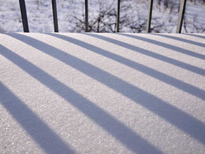 Beautiful snow covered surface on a balcony royalty free stock photo