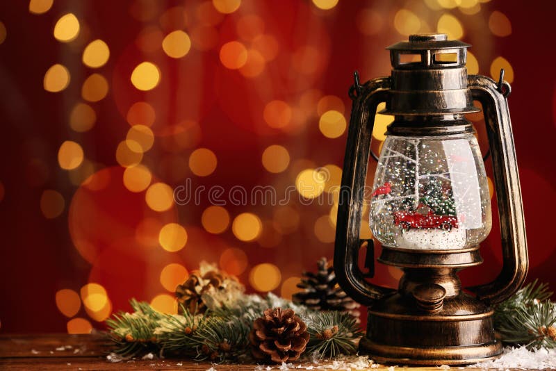 Beautiful Snow Globe in Vintage Lantern on Table Against Blurred ...