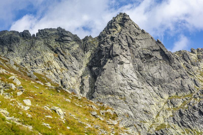 The beautiful solid wall of the Wolowa Turnia Volia veza peak with the climbing classics of the Slovak Tatras