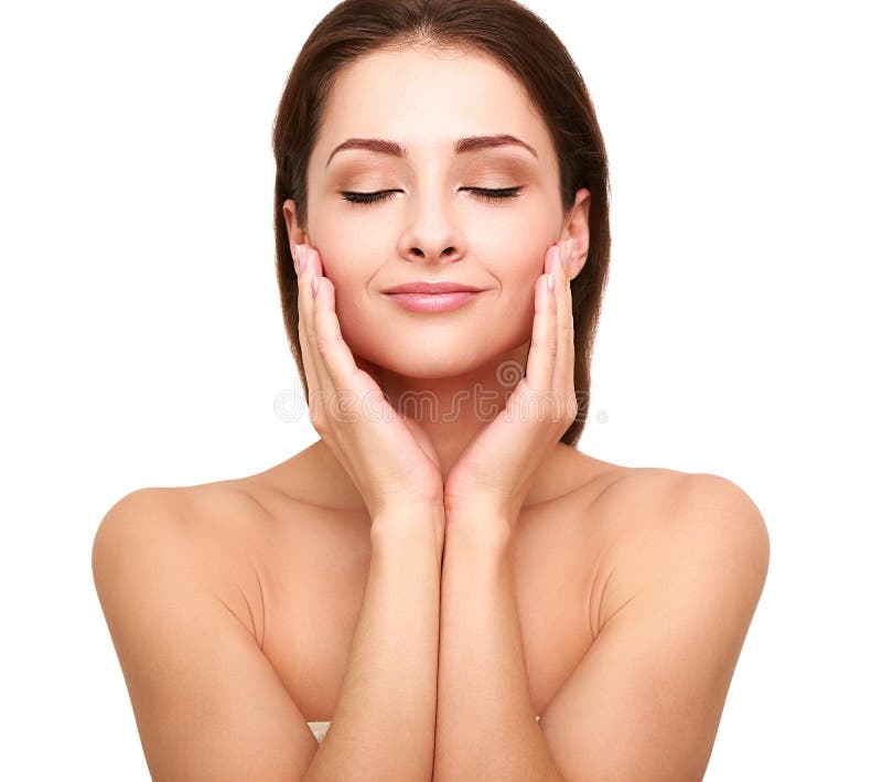 Beautiful spa woman with clean beauty skin touching her face