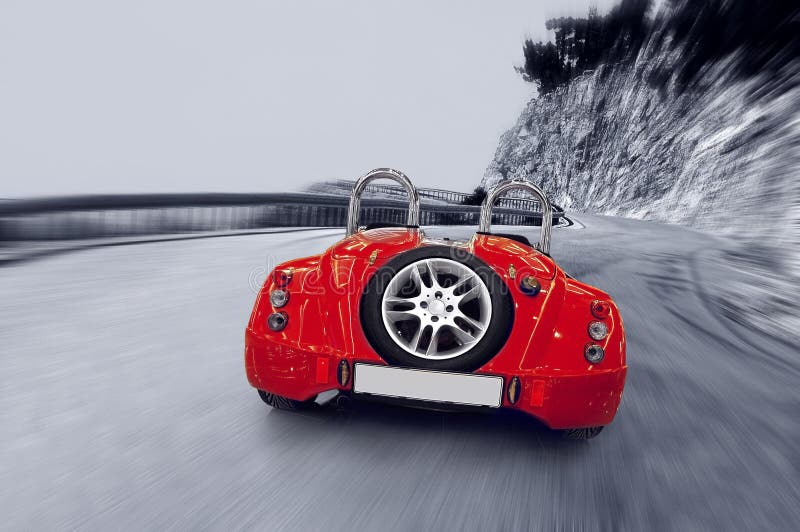 Beautiful speed red sportcar on the road