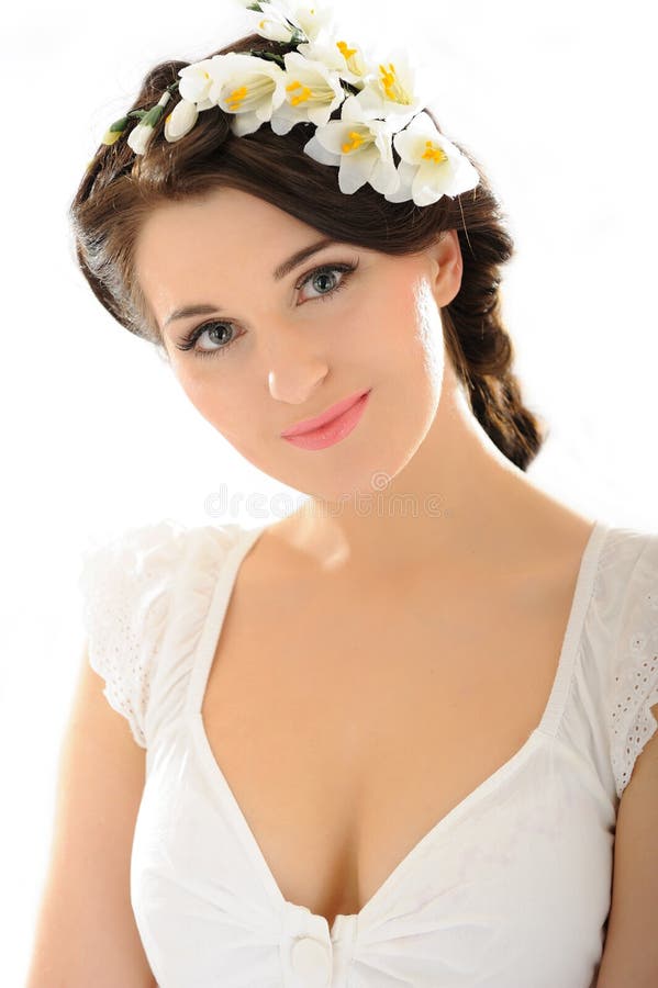 Beautiful spring woman with pure skin and flowers