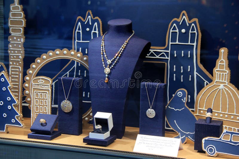 Beautiful storefront window with cityscape theme showcasing fine jewelry,DeBeers,NYC,2015