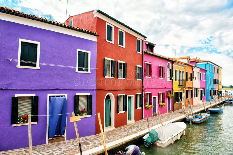 Beautiful street with multicolored houses, Burano island, Venice, Italy royalty free stock photos Beautiful street with multicolored houses, Burano island, Venice, Italy royalty free stock photos
