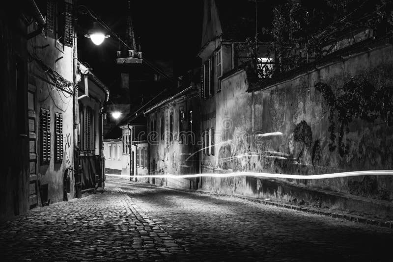 Beautiful street at night in Sibiu, Romania stock photo Beautiful street at night in Sibiu, Romania stock photo