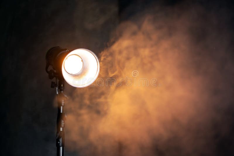 Neuropati Tag fat person Beautiful Studio Light for a Movie and TV Show and Photo on a Dark  Background with Smoke. a Ray of Light Penetrates the Smoke and Stock Photo  - Image of background, cinematography: