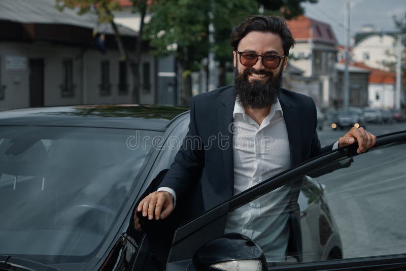 Portrait stylish, handsome man near car outdoors royalty free stock image Portrait stylish, handsome man near car outdoors royalty free stock image