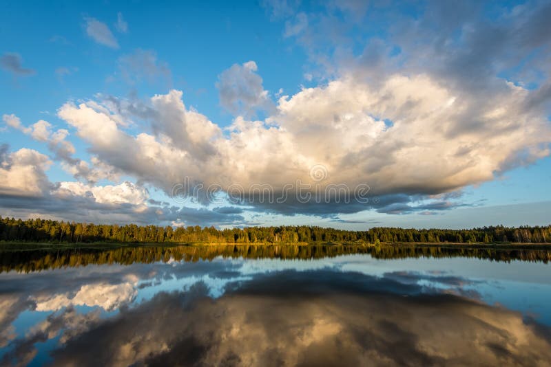 Beautiful Summer Sunset At The Lake With Blue Sky Red And Orange