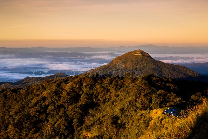 Beautiful sun rise on top mountain with could and camping area royalty free stock photography Beautiful sun rise on top mountain with could and camping area royalty free stock photography