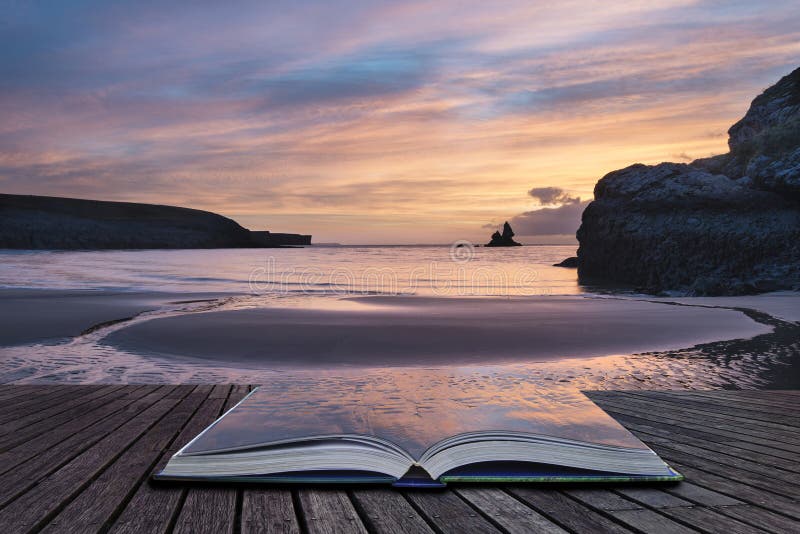 Stunning sunrise landsdcape of idyllic Broadhaven Bay beach on Pembrokeshire Coast in Wales in pages of imaginary story book. Stunning sunrise landsdcape of idyllic Broadhaven Bay beach on Pembrokeshire Coast in Wales in pages of imaginary story book