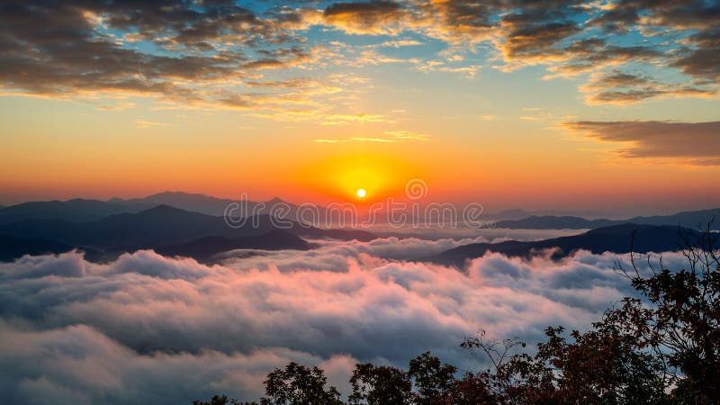 Beautiful sunrise at mountains is covered by morning fog in Seoul,Korea