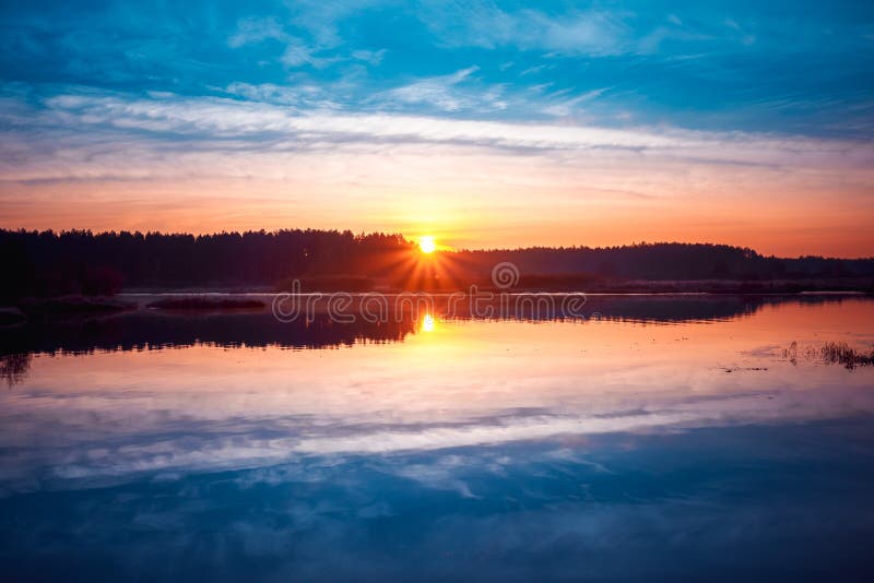 Beautiful Sunrise Over Calm Lake River In Autumn Sunset Stock Photo
