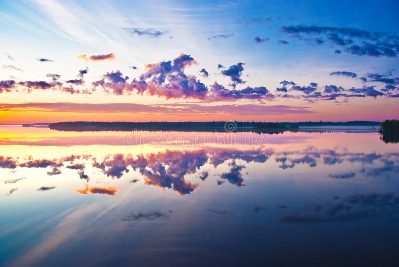 Beautiful sunrise over lake stock photography