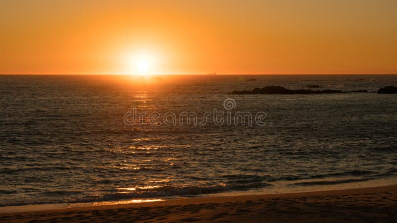 Beautiful sunset on beach in Portugal as sun dips below horizon royalty free stock image Beautiful sunset on beach in Portugal as sun dips below horizon royalty free stock image