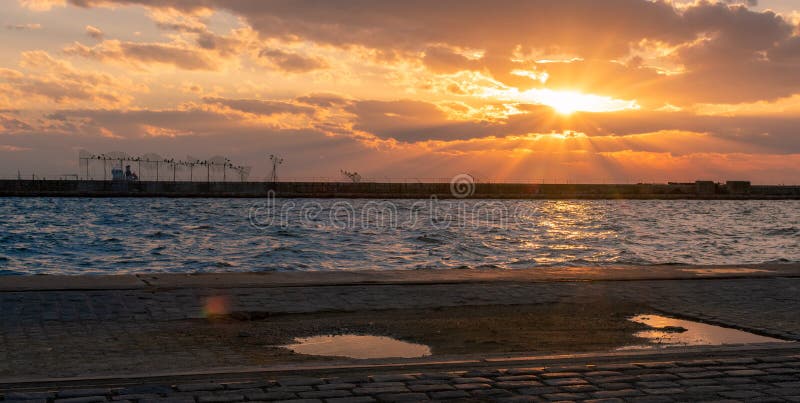 Beautiful sunset captured by the moment the sun is going down in the sea