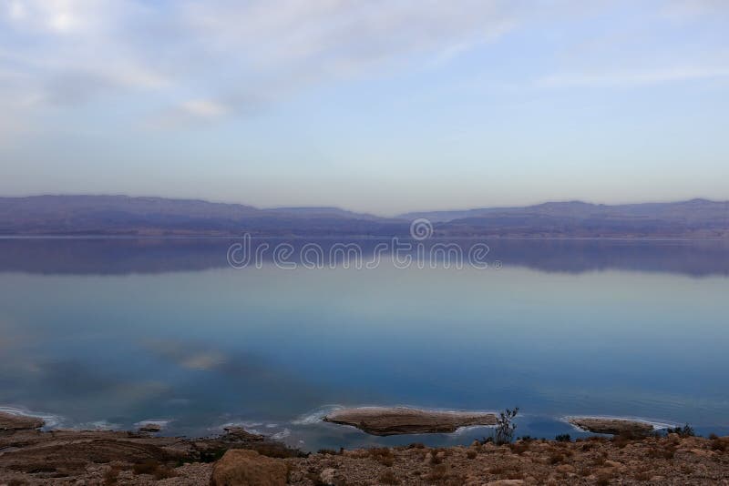 Beautiful sunset in lilac tones over the dead sea. View from Israel coast to Jordan side. stock image Beautiful sunset in lilac tones over the dead sea. View from Israel coast to Jordan side. stock image
