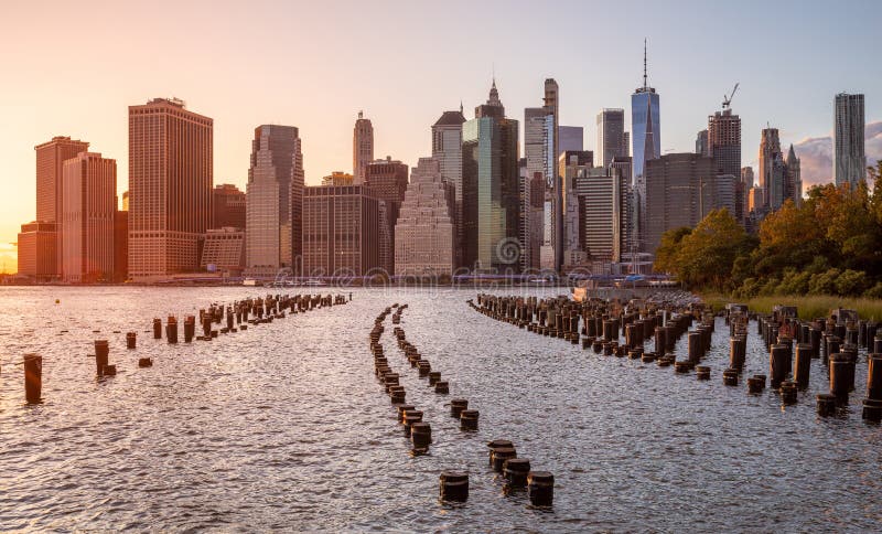 Beautiful Sunset And Lower Manhattan Skyline With East River And New