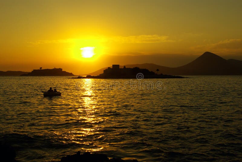 Beautiful sunset in Montegro seaside with boat