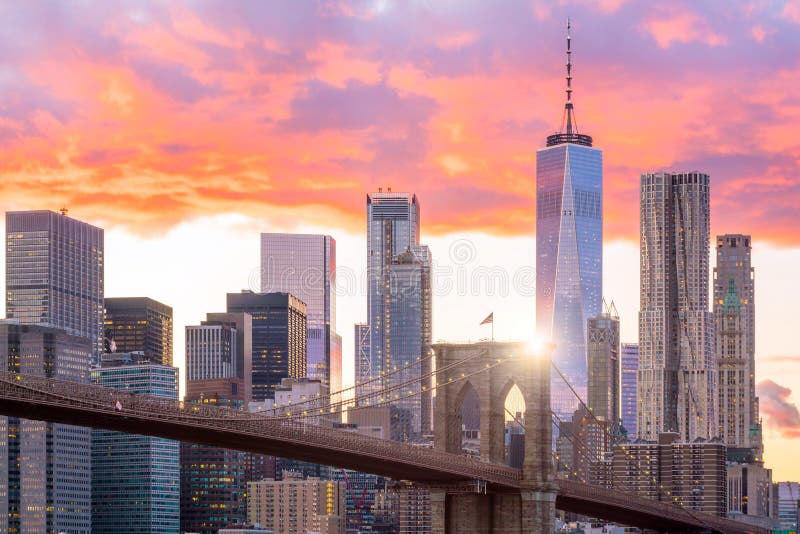 Beautiful sunset over brooklyn bridge in New York City