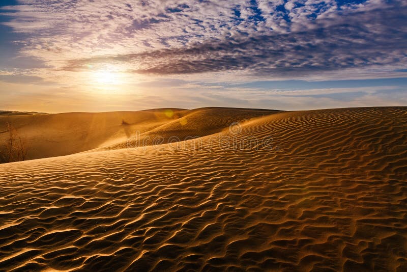 Beautiful sunset in sand dunes over desert royalty free stock photo Beautiful sunset in sand dunes over desert royalty free stock photo