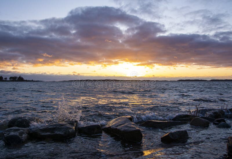 Beautiful sunset sky, Gulf of Finland and coastal view in winter, Kopparnas Kopparnas, Inkoo, Finland