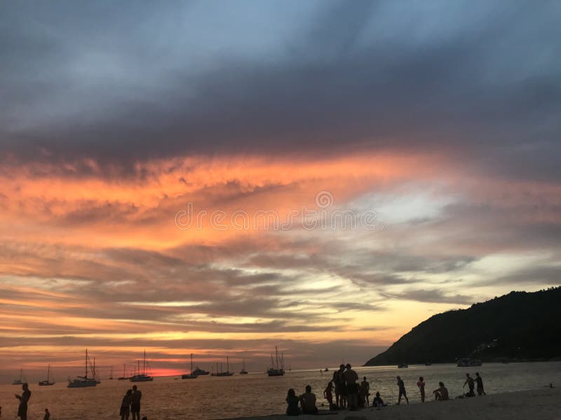 Sunset On Beach With Pastel Colorful Umbrella And Beautiful Sunlight