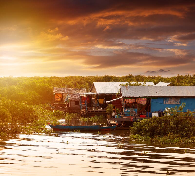 Beautiful sunset on Tonle Sap Lake and water village. Cambodia