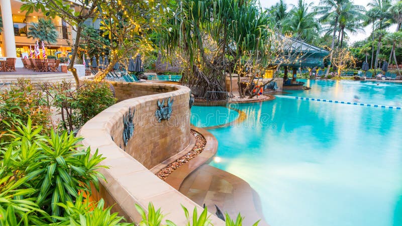 Beautiful swimming pool in tropical resort , Phuket, Thailand.