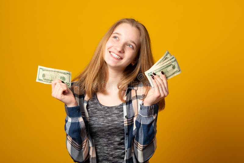 Beautiful Teen Girl Holding Dollars. Happy Girl Holding Money Banknotes ...