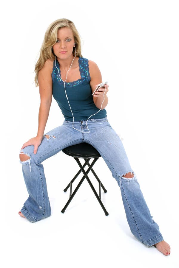 Beautiful Teen Girl Listening To Music