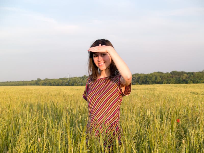 Beautiful Teen Lady Looks in Field