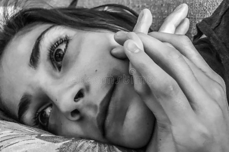 A beautiful teenage girl lying down royalty free stock photo A beautiful teenage girl lying down royalty free stock photo