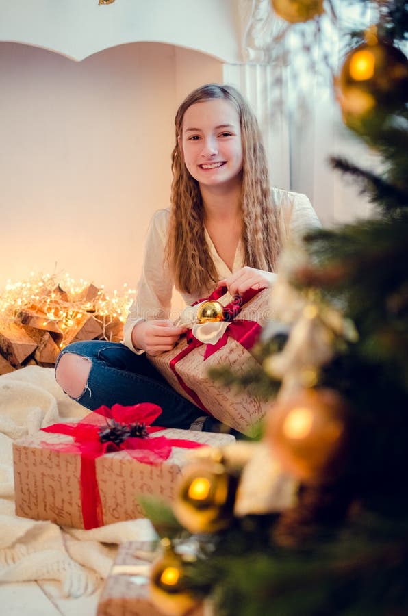 Teenage Girl Opening the Present Stock Image - Image of present ...