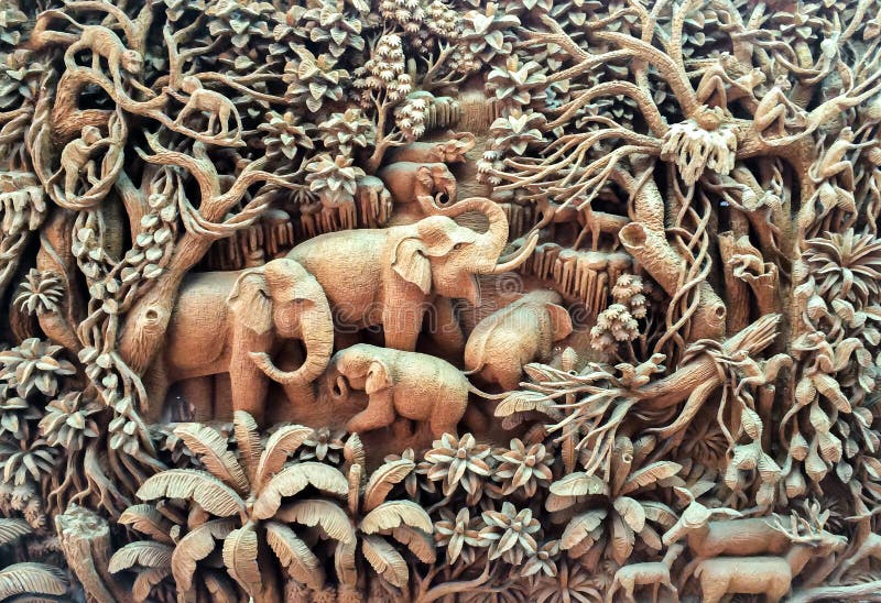 Beautiful Thailand Antique Art Handmade Furniture. Carvings Elephant Family in The Wood on The Wooden Frame used as Antique Design stock images Beautiful Thailand Antique Art Handmade Furniture. Carvings Elephant Family in The Wood on The Wooden Frame used as Antique Design stock images